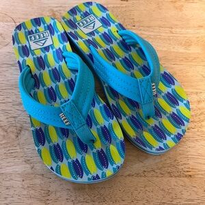 Reef Kids Flip Flops - Blue and Yellow Surfboard Pattern